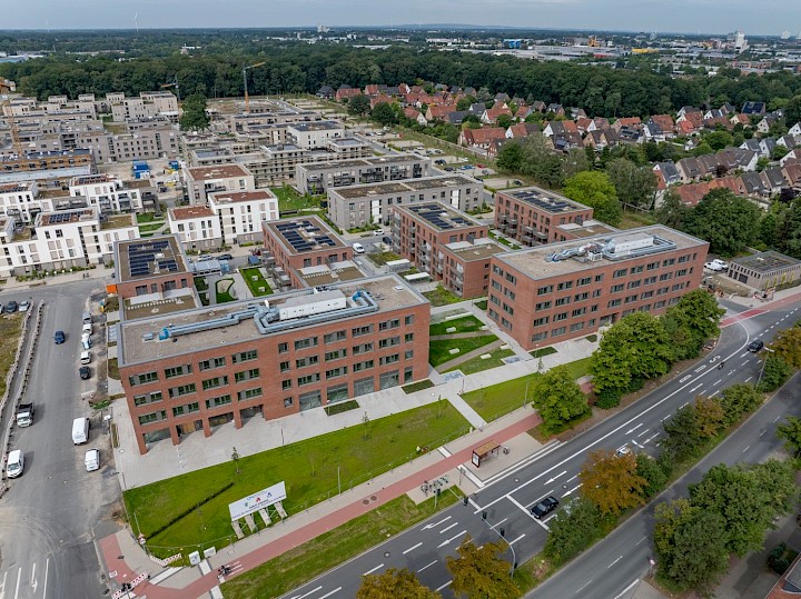 Die von CM errichteten Immobilien im York-Quartier in Münster-Gremmendorf - Klinkerbauweise im Vordergrund), vorne links das Gesundheitshaus an der Ecke Albersloher Weg / Essexweg.