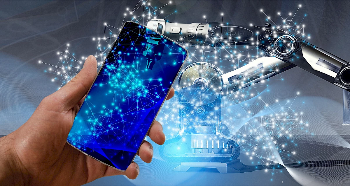 A smartphone and an industrial robot arm connected by schematically depicted data nodes.